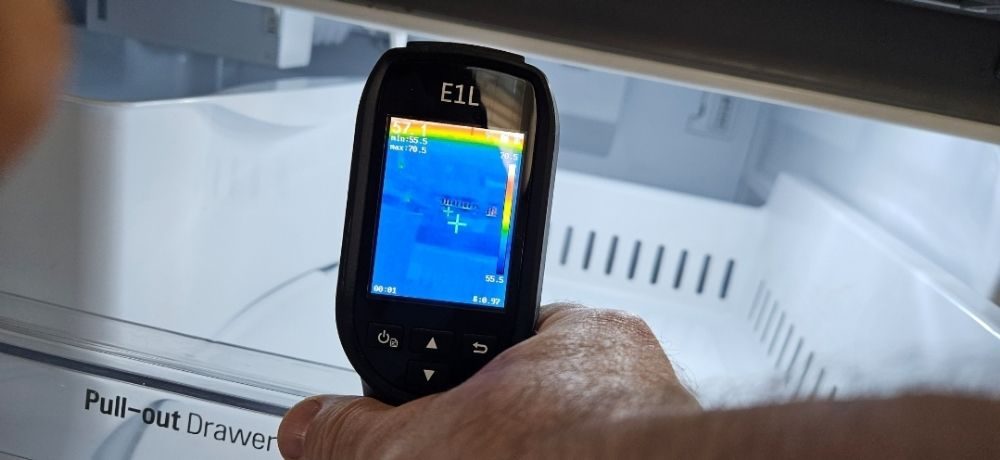 Thermal imaging camera reading temperatures inside a refrigerator